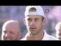 Federer receives his trophy after winning Wimbledon Championship 2009 Final