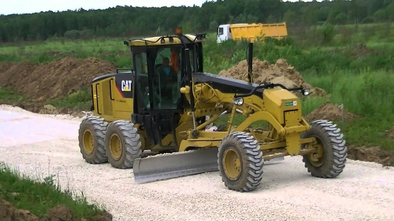 Cat 140M Spreading Gravel Part 2 YouTube