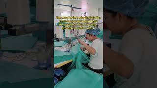 Green Disposable Hospital Gowns in production
