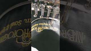 Bai Vision embroidering a hat