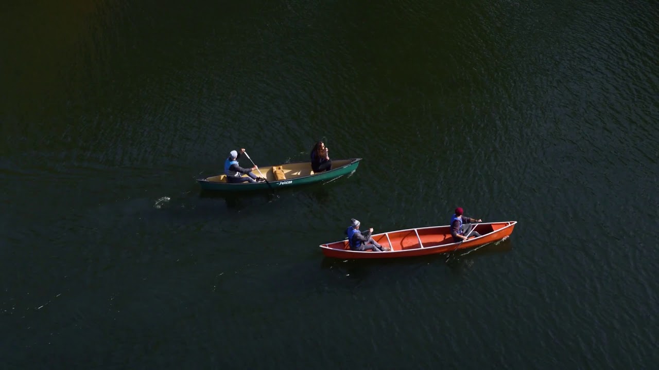 aerial shot canoing on lake canoe lake placid mountain wilderness YouTube