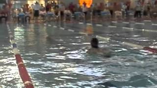 Me swimming boy's 100 meter breaststroke heat