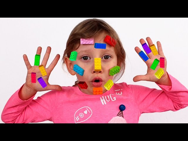 Alena and mom plays with Lego Toys on their Faces and Hands | Clap your hands class=