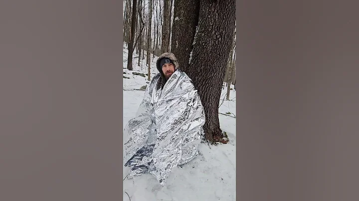Pocket sized heated survival shelter