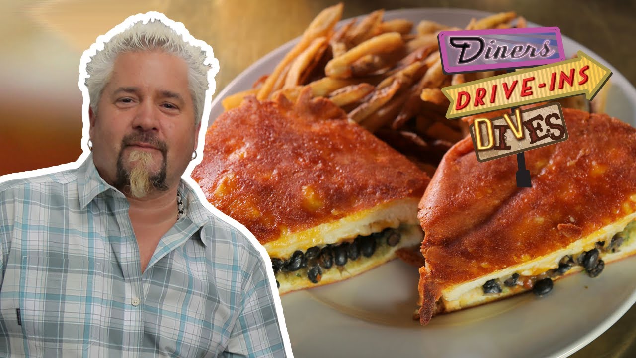 Guy Fieri Eats INSIDE-OUT Grilled Cheese | Diners, Drive-ins and Dives with Guy Fieri | Food Network