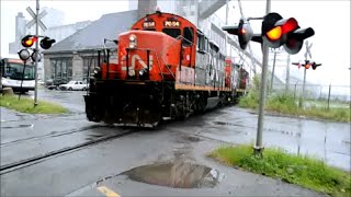 OLD CN GP-9 LOCOMOTIVES IN THE RAIN