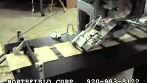 FASTPAQ HIGH SPEED LABELER ON A WALCO FEEDER CARTON LABELER