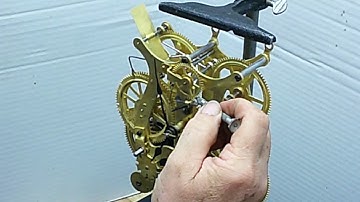 How to keep a clock in beat using a timing machine