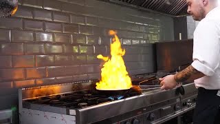 Chef Working In The Kitchen Stock Video screenshot 1