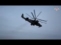 Russian combat helicopters in the sky of donbass