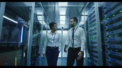 Data Engineers In Server Room Stock Video