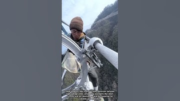 How Do Power Line Workers Safely Install Isolators in the Air?