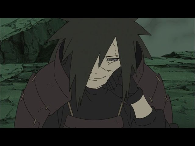 Download Madara Uchiha in a Powerful Pose | Wallpapers.com