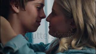 stock footage happy teenage couple first kiss girl kissing boyfriend at home after romantic evening