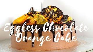 Chocolate and orange cake, center filled with ganache creamed cream–
three layers of moist, vegan soaked fr...