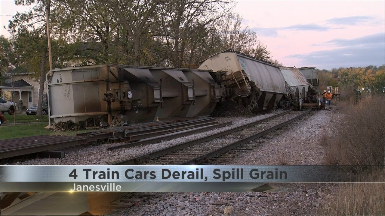 Four train cars derail, spill grain in Janesville YouTube