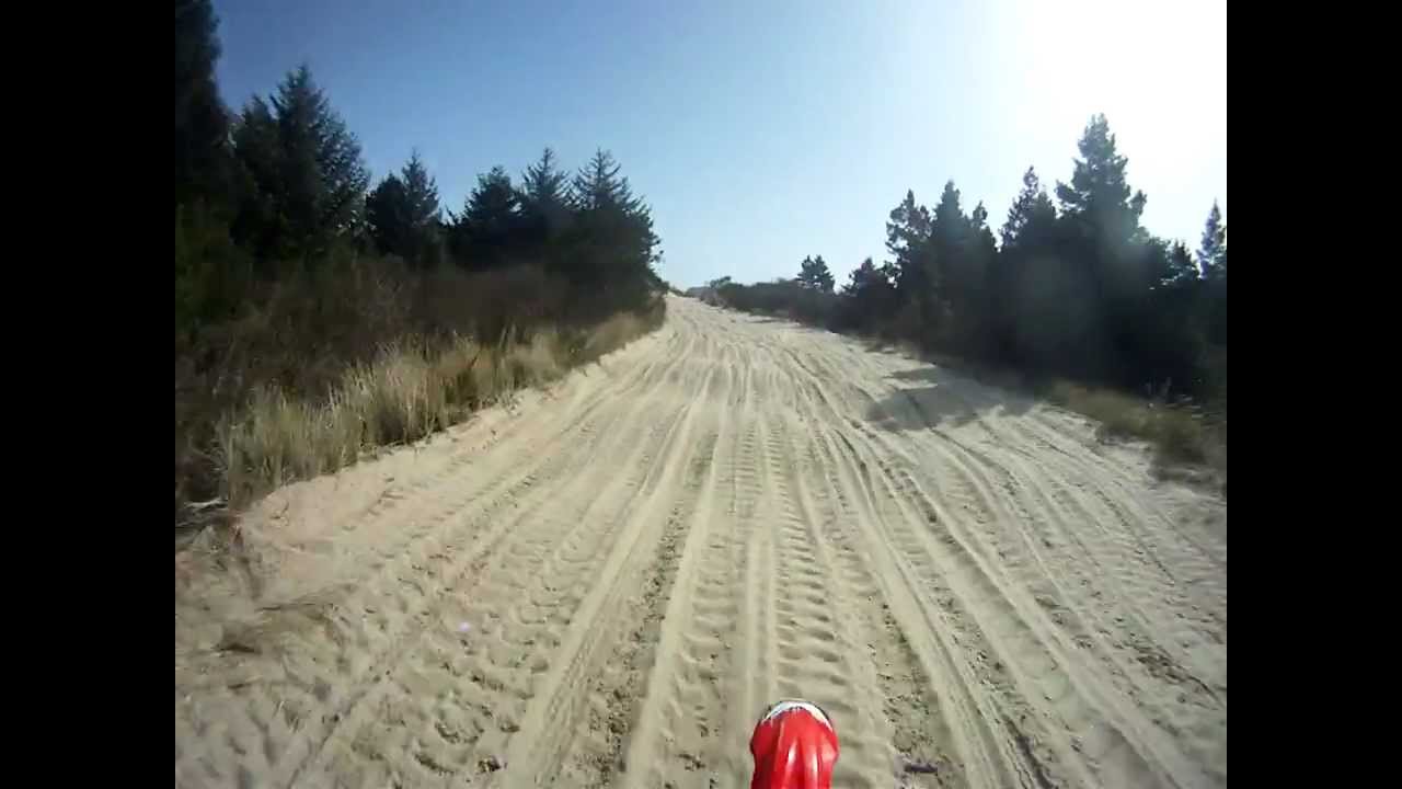 Motorcycles and ATV in Florence Oregon dunes - YouTube
