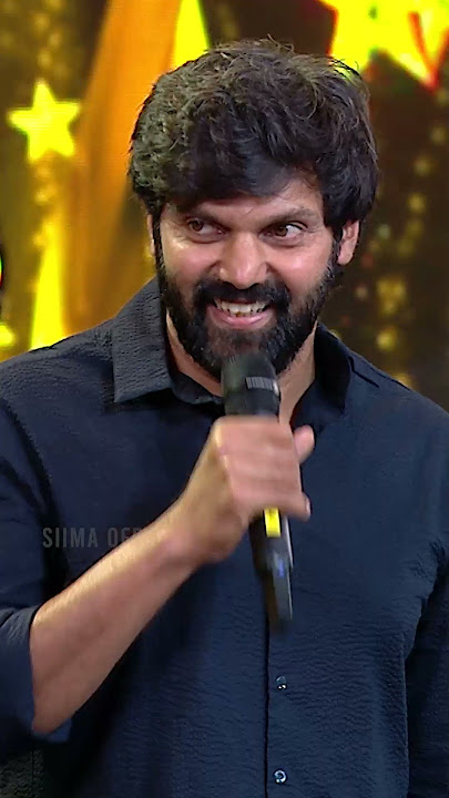 Simbu enjoying Mirchi Shiva's counters on Arya at South Movie Awards