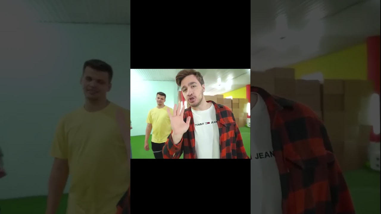 They test the box by throwing rocks at it with a slingshot