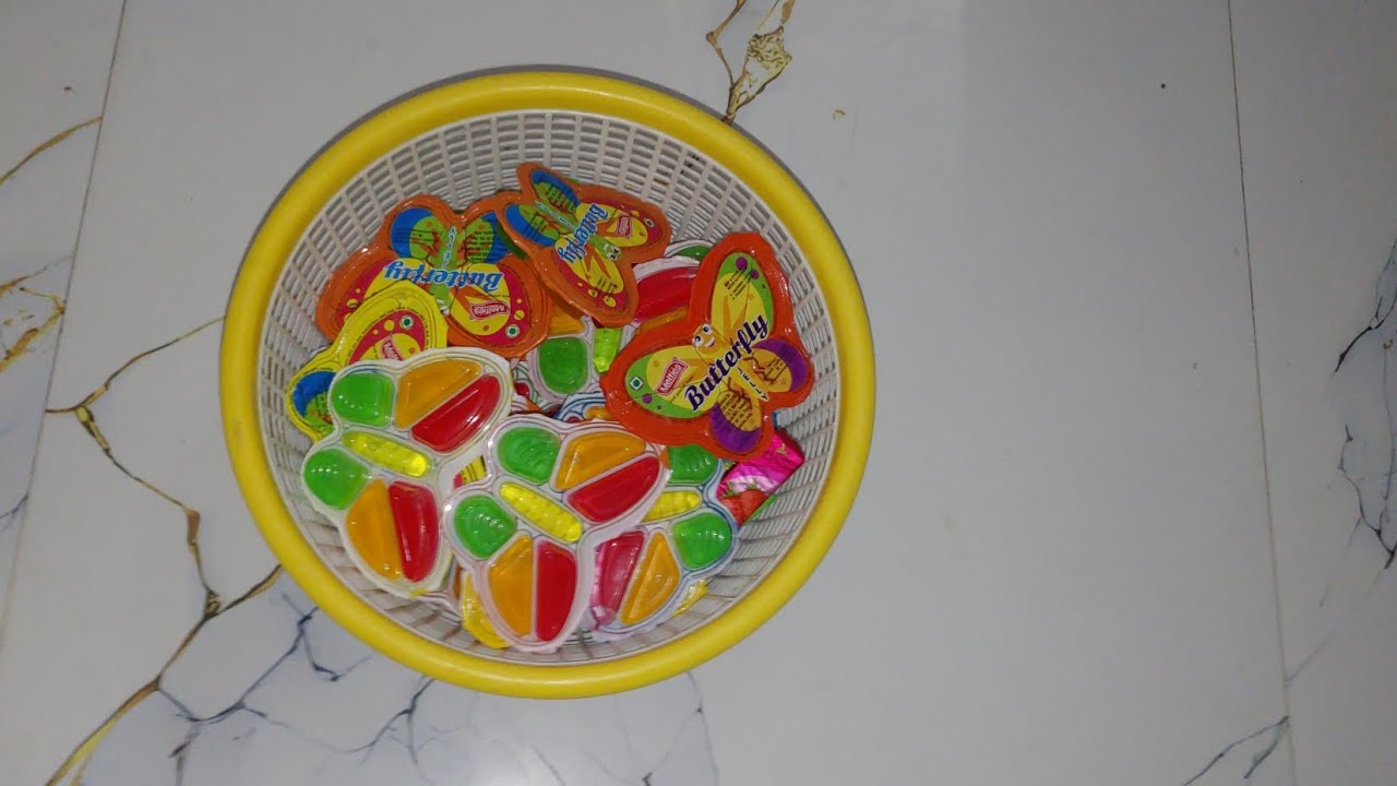 Colourful butterfly jelly and 1 boomer chewing gum 