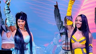 cardi b pops out with Gorilla at amas and performs Tomorrow 2 .