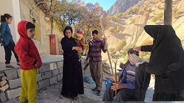 Building a platform in front of the house: Atabek and Shahin