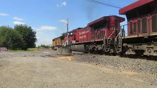 Union Pacific crosses NE 158th Ave with hoppers in Portland, Oregon on the 12th of August 2022