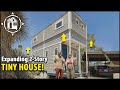 Tiny house w/ an elevator roof raise to create 2nd floor