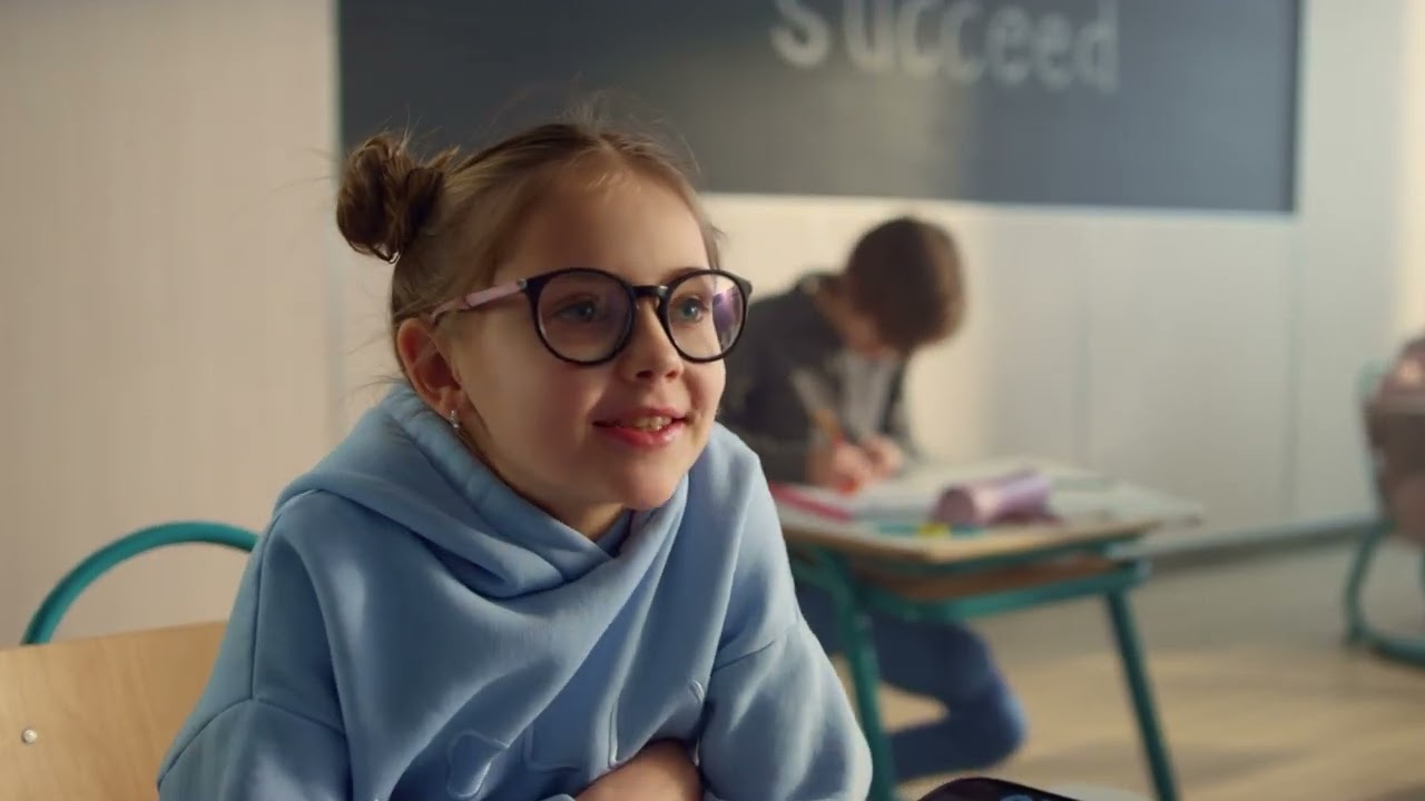 Video preview image of A girl and boy in a classroom setting, EIRMC and YouTube logos with the heading, ADD & ADHD: Tips to Help Your Child; click to visit the ParentSquare post with the video