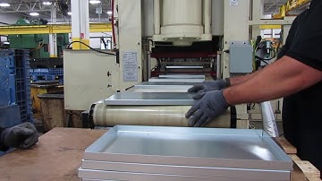 Metal stamping a highly cosmetic part in the servo press