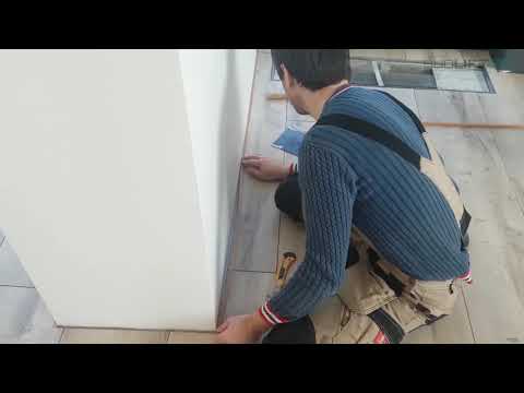 Пробковый компенсатор. Укладка ламината без плинтусов. Laying laminate without plinths