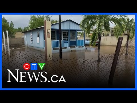 Puerto Rico hit with flooding, power outages from Hurricane Erin