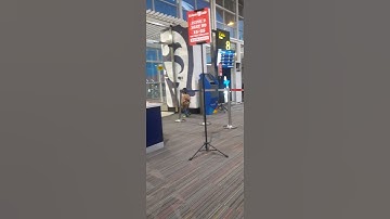 Di ruang tunggu pesawat bandara kuala namu