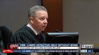 Former Vegas police detective held without bail