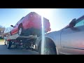 Loading a car on rollback manual wheel lift and using lasso straps