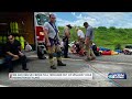 Teen rescued after driving into large hole filled with water near Herington Lake