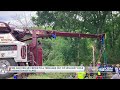 Teen rescued after driving into large hole filled with water near Herington Lake