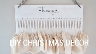 DIY CHRISTMAS ADVENT CALENDAR: Step One: Buy materials (Michaels Craft Store: 12x24 birch wood board, grey paint, white 
