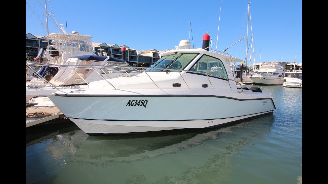 Boston Whaler Conquest 345 for sold by Peter Hansen Yacht Brokers Raby Bay