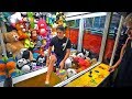 Sneaking into GIANT TOY CRANE MACHINE! *kicked out*