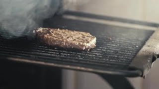 Flipping Burger Patty Stock Video