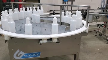 12 Head Overflow Filler with 2 Rotary Tables