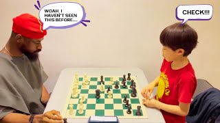 8 - Year - Old Isaac Takes On Nigerias Chess Master Tunde Onakoya