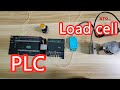 How does PLC read data of load cell transmitter