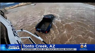 Chopper Lands On Truck While Rescuing Driver From Arizona Flood