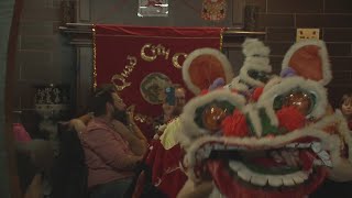 Lion dance, red envelopes help mark QCCA Lunar New Year event