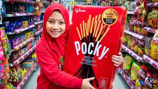 AQILA BUYS A GIANT POCKY AT ALFAMIDI
