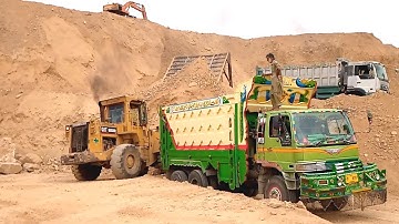 Cat 950B Wheel loader Loading Hino Dumper Truck