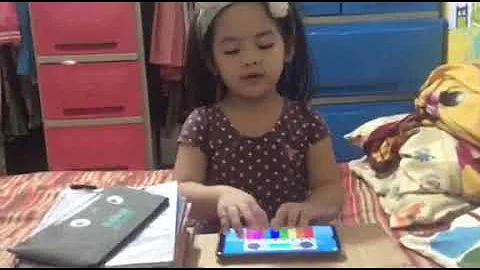 Mimay playing piano