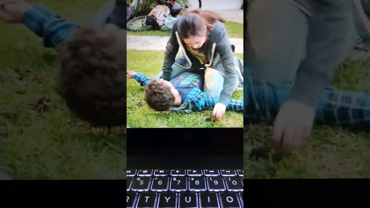 Rhonda riding Luke in their yard | Modern Family 